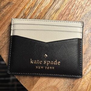 This very cute small easy to use mini wallet from Kate Spade